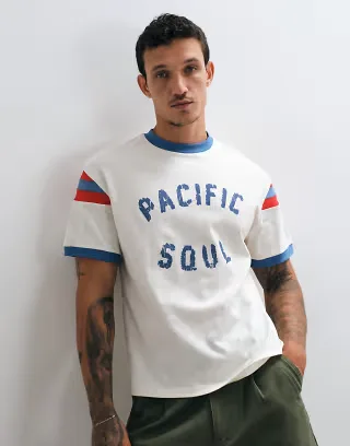 ASOS DESIGN boxy relaxed ringer t-shirt with distressed pacific soul graphic in cream