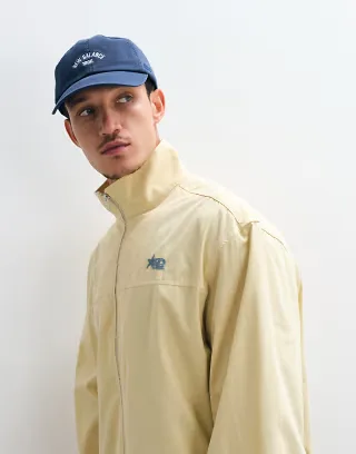 ASOS DESIGN boxy oversized zip up funnel neck jacket with chest embroidery in yellow