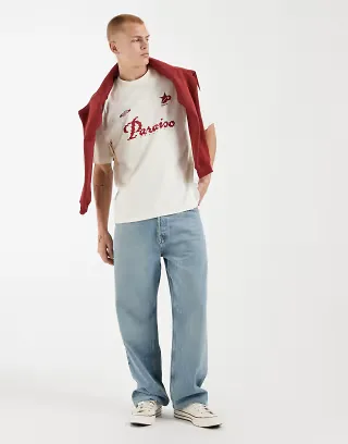 ASOS DESIGN oversized T-shirt with soccer placement in off white