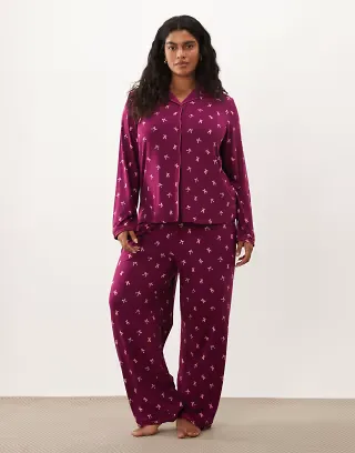 Urban Threads Curve long sleeve button up shirt and pants pajama set in burgundy bow print