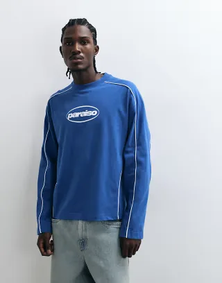 ASOS DESIGN boxy oversized long sleeve T-shirt with paraiso graphic in blue