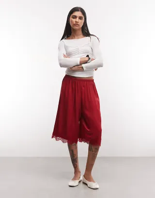 Reclaimed Vintage longline satin shorts with lace trim in red