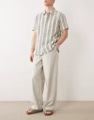 ASOS DESIGN loose elasticated trouser with pleat in stone herringbone