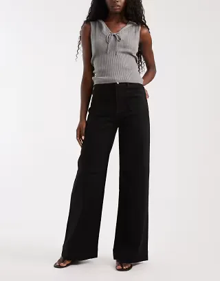 ASOS DESIGN high rise wide leg jeans with front pockets in black