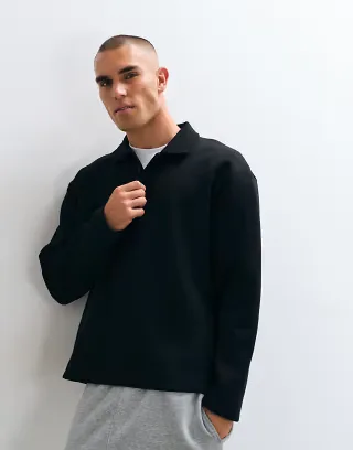 ASOS DESIGN relaxed long sleeve polo shirt in black scuba-style fabric