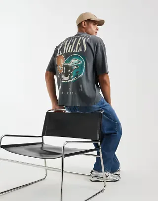 ASOS DESIGN oversized T-shirt with NFL Philadelphia Eagles print in washed black