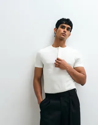 ASOS DESIGN muscle fit T-shirt with henley neck in cream textured fabric