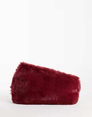 ASOS DESIGN asymmetric clutch in burgundy faux fur