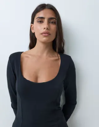 ASOS DESIGN cotton scoop neck long sleeve top with shoulder pads in black