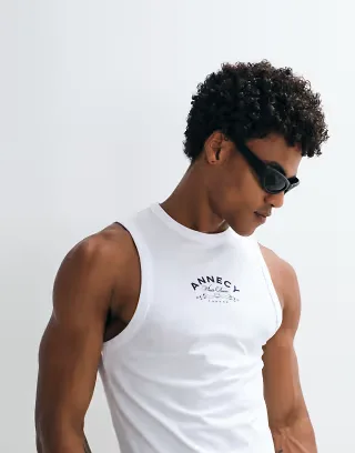 ASOS DESIGN muscle tank top with text graphic in white