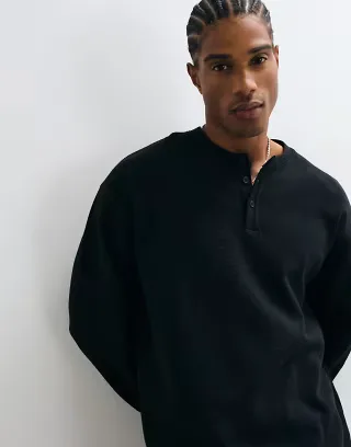 Reclaimed Vintage long sleeve waffle knit Henley T-shirt in black