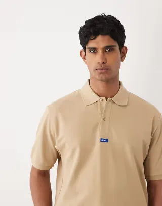 HUGO Blue Nolitos loose fit polo shirt in beige