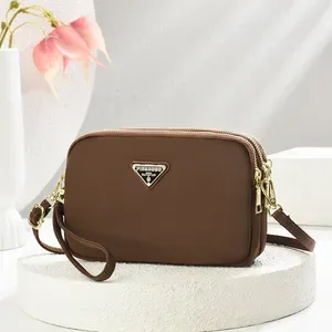 Free shipping 2026 new style fashionable camera bag nylon Oxford cloth womens shoulder bag crossbody bag hot sale variou