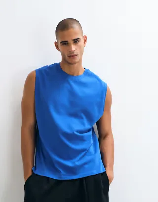 4505 Icon cotton oversized pump training tank with quick dry finish in royal blue