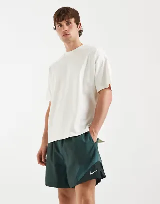 Nike Windrunner shorts in dark green