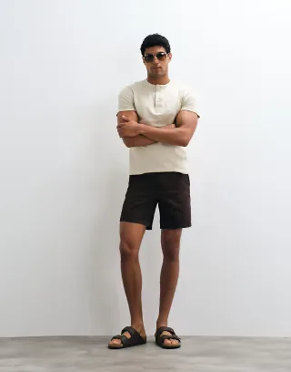ASOS DESIGN slim fit chino shorts in mid length in brown