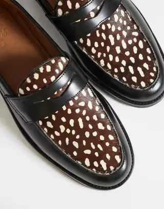 ASOS DESIGN penny loafers with pony hair apron in black leather