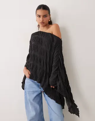 ASOS DESIGN textured fabric asymmetric half sleeve cape in black