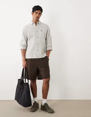 ASOS DESIGN oversized textured plaid shirt with embroidery in black and off white