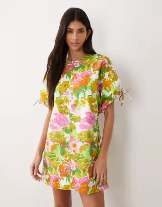 ASOS DESIGN crew neck mini dress with tie sleeve detail in green and pink floral print