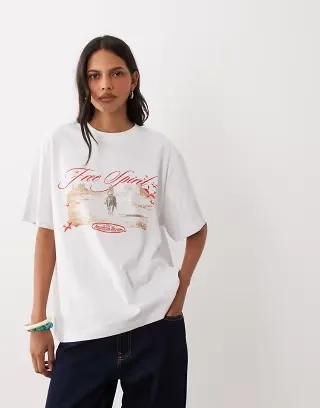 ASOS DESIGN oversized t-shirt with Free Spirit rodeo graphic in white