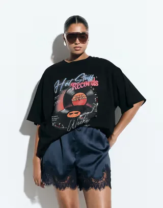 ASOS DESIGN Curve embellishment oversized T-shirt with vintage vinyl graphic in black