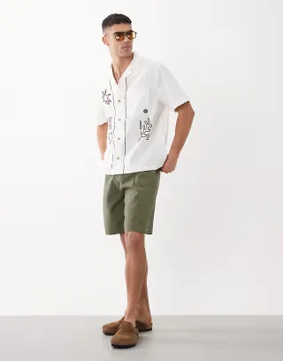 ASOS DESIGN mid length canvas jorts with pleat styling in khaki