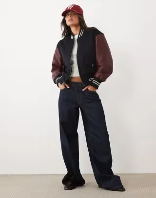 Good American faux leather varsity jacket in navy