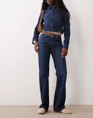 Good American ghost waist low rise bootcut jeans in indigo