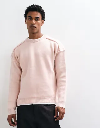 ASOS DESIGN oversized crew neck sweater in pale pink heather with exposed seams