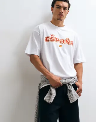 ASOS DESIGN oversized t-shirt with Spain graphic in white