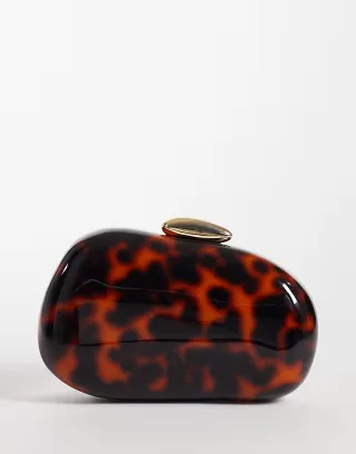 True Decadence hard shell clutch purse in brown tortoisehell effect
