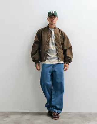 ASOS DESIGN oversized distressed faux leather bomber in brown