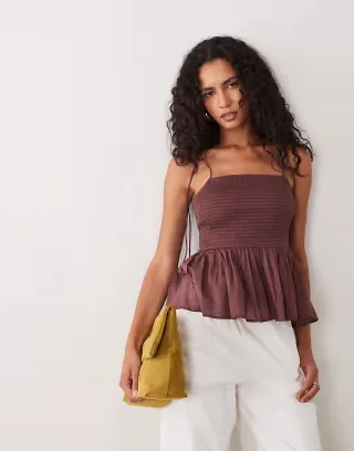 ASOS DESIGN shirred detail peplum cami in burgundy